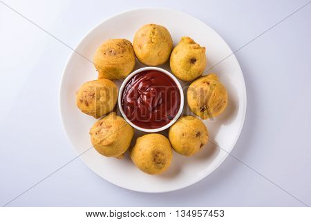 indian snacks also known as urad daal vada or indian pakoda or couth indian pakora or batata vada or aalu bonda or aalu bonde