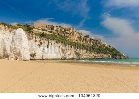 Golden Sand Beach Of Vieste With Pizzomunno Rock, Gargano Peninsula, Apulia, South Of Italy