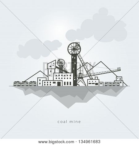 Coal mine with waste heaps and with rail cars