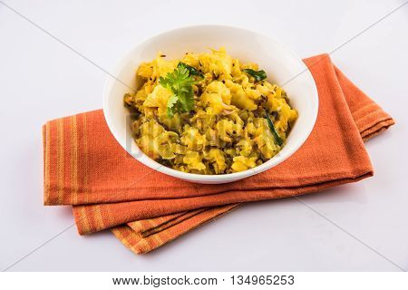 indian semi dry potato spicy recipe also known as aalu bhaji or aalu sabji or dry potato curry