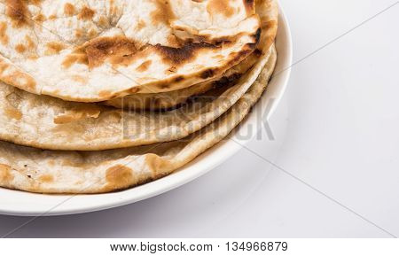 Homemade Indian Naan Flatbread made with Whole Wheat, plain indian roti, plain tandoori roti