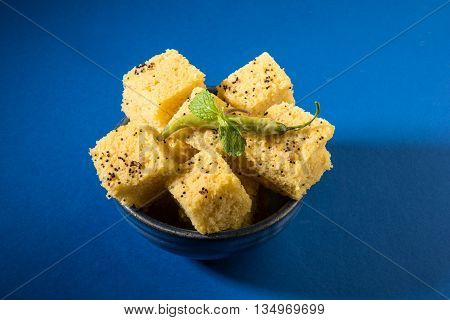 Gujrati famous snack made up of gram flour, semolina called khaman Dhokla