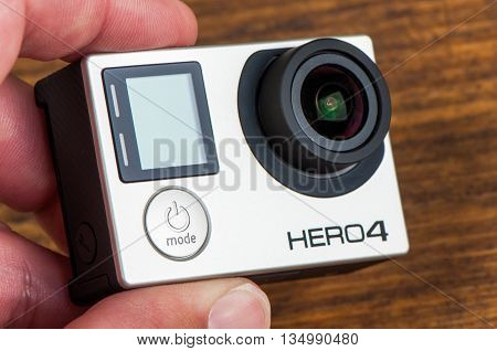 NOVI SAD SERBIA - JUNE 19 2016: GoPro Hero 4 Black waterproof action camera announced in september 2014 captures slow motion at up to 240 frames per second illustrative editorial