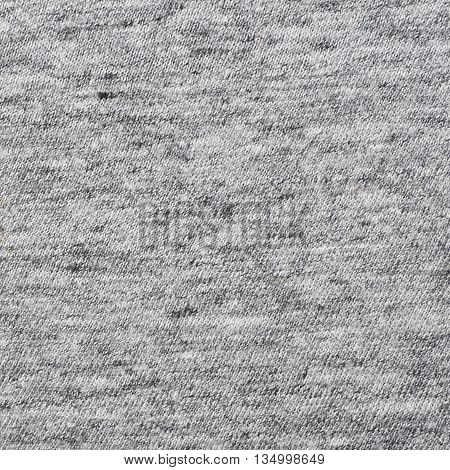 Fragment of a gray cloth fabric material texture as an abstract background composition