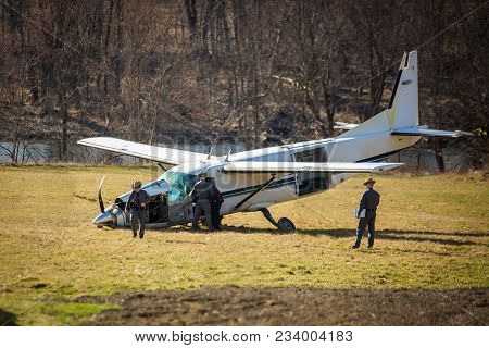 Crashed Broke Plane On Field With Police Investigating