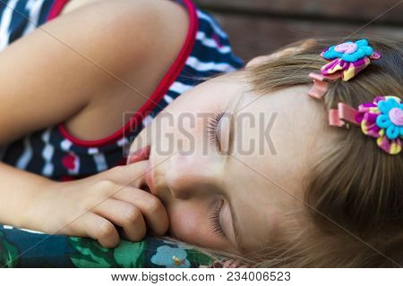 Little Pretty Girl Sleeping, Sucking Thumb And Having Sweet Dreams