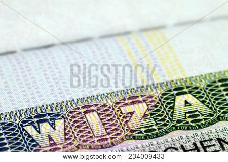 Close Up Of Visa In Passport. Poland Of Shengen Travel Concept.
