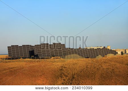 Power Plant From Batteries Of Solar Cells On The Shore Of Kapchagai Lake In Kazakhstan.