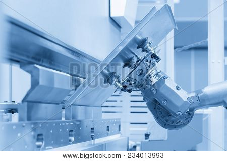 The Robot For Metal Handing Sheet Metal In Forming Process .modern Factory For Industrial 4.0 Manufa