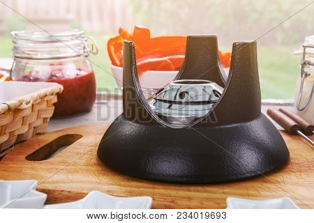 Table Served For Outdoor Picnic With Alcohol Burner For Fondue In The Foreground. Toned