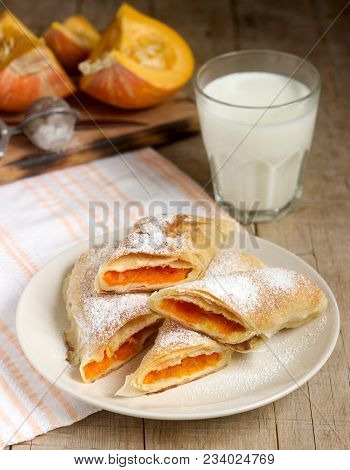 Traditional Romanian Or Moldovan Pumpkin Strudel Vertuta Served With Milk. Rustic Style, Selective F