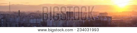 Panoramic View Of Beautiful Yellow Golden Sunset Over Ivano-frankivsk City, Ukraine. Evening Urban L