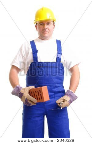 Builder avec briques et truelle