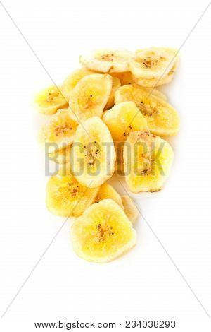 Heap Of Dried Banana Chips Snack Over White Background