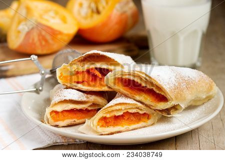 Traditional Romanian Or Moldovan Pumpkin Strudel Vertuta Served With Milk. Rustic Style, Selective F