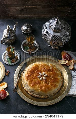 Traditional Moroccan Pie Pastilla With Mint Tea.