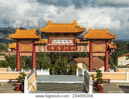 Hacienda Heights, Ca, Usa - March 23, 2018: Red And Ochre Colored Torii Enrance Gate To Hsi Lai Budd