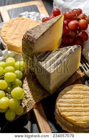 Tasting Of Oldest French Aoc Soft Pudgent Yellow Cheese Livarot,  Munster And Semifirm Tomme French