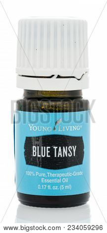 Winneconne, Wi - 23 March 2018:  A Bottle Of Young Living Blue Tansy Essential Oil On An Isolated Ba