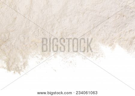 Pile Of Flour Isolated On White Background With Copy Space For Your Text. Top View. Flat Lay.