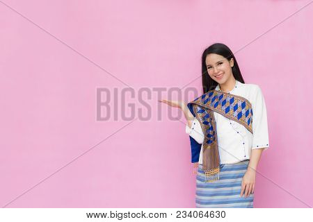 Portrait Beautiful Asian Girl In Traditional Thai Dress Isolated On Pink Background. 
Cotton Dress