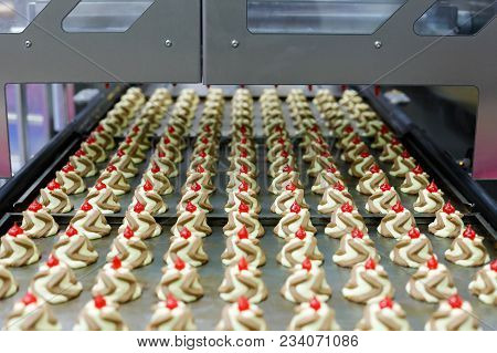 Twin Colour Jam Drops Cookies On A Production Line. Selective Focus.