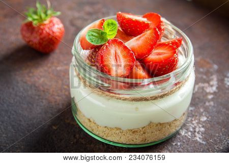 Cheesecake With Strawberries In Jar