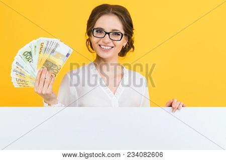 Caucasian Brunette Smiling Attractive Businesswoman In Formal Dress Holding Money In Her Hands With 
