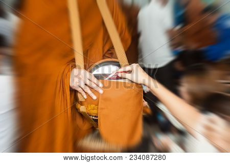 Buddhist Monks Receive Food From The Food To The People Who Have Come Forward In Large Measure, Is L