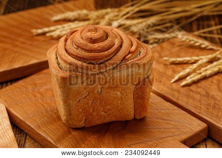 Delicious, Homemade, Beautiful, Bread On A Wooden Background In A Rustic Style. Freshly Baked Bread 