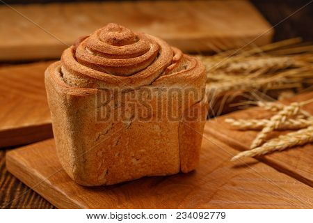 Still Life With Fresh Delicious Garlic Bread And Spikelets. Beautiful Homemade Bread On A Textured W