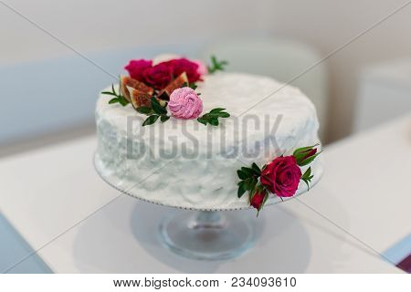 White Cake With Red Flowers. White Background