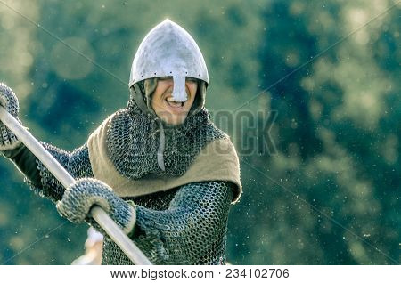 Ritter Weg, Russia, Morozovo, April 2017: Attack Of Powerful Knights In Heavy Armor On The Dungeon B