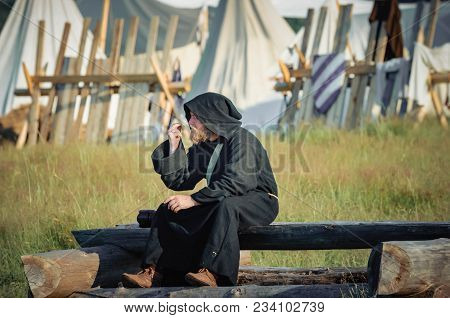 Ritter Weg, Russia, Morozovo, April 2017: Festival Of The European Middle Ages. Monks In Long Black 
