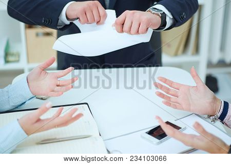 Breaking Contract. Furious Young Businessman Tearing Up Employment Contract.
