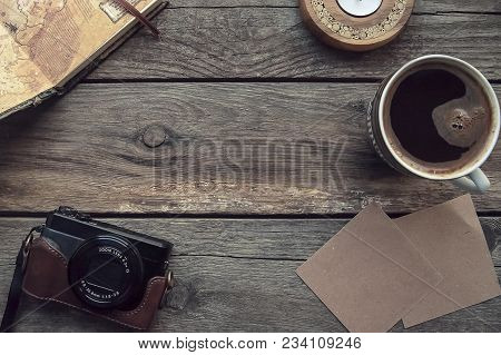 Travel And Vacation Items On Old Wooden Table. Top View