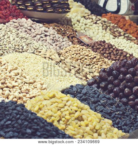 Counter With Nuts And Dried Fruits On The Market.