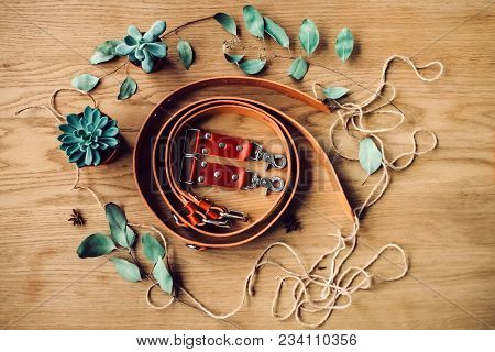 Unloading Belt For The Photographer On Wooden Background. Top View. Artwork