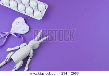 Easter Accessories For Ultraviolet Background. Easter Bunny Vintage Heart Set Of Eggs In A Box. Flat