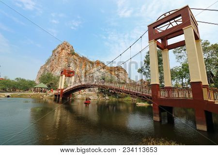 Ratchaburi , Thailand - March 10 , 2018 : Bridge Over Water Lake Of Khao Ngu Stone Park