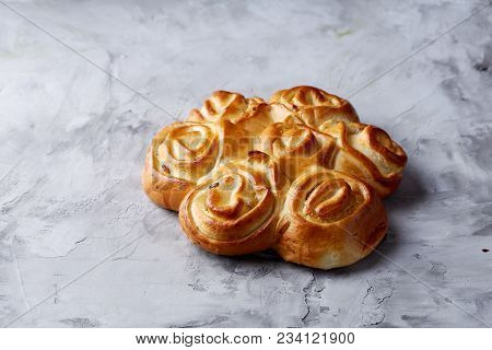 Homemade Rose Bread With Raisins Over White Textured Background, Close-up, Top View, Shallow Depth O