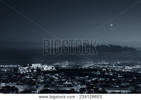 Athens skyline at night viewed from Mt Lykavitos with Acropolis, Greece.