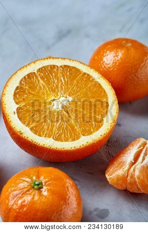 Variety Of Fresh Citrus For Making Juice Or Smoothie Over Light Textured Background, Topview, Select