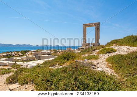 The Portara, One Of Naxos Most Famous Landmarks In Naxos (chora) Town. Cyclades Islands, Greece.