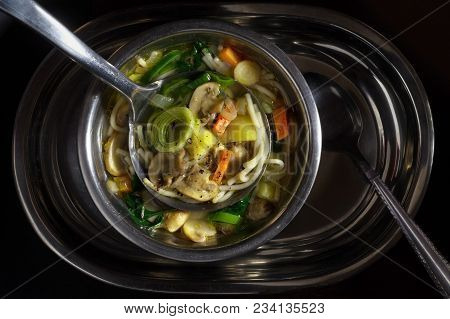 Mushroom Soup In A Metal Plate On A Tray