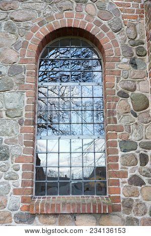 Tree Reflection In A Window. Uggeløse Church In 2017