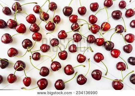 Fresh Red Cherries Lay On White Isolated Background With Copy Space. Background Of Cherries. Ripe Ch