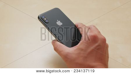 Hong Kong, Hong Kong, 01 March 2018:- Hand holding IphoneX 