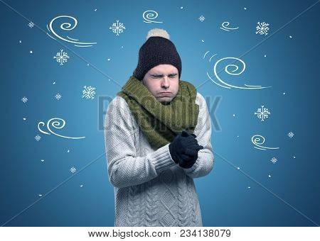 Young hipster frozen boy with doodled snowflakes and windy concept