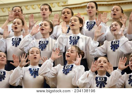 SAINT-PETERSBURG, RUSSIA - FEBRUARY 25, 2018: Choir Kapel, Russia performs during V Children and Youth World Choral Championship. First championship was held in Hong Kong in 2011